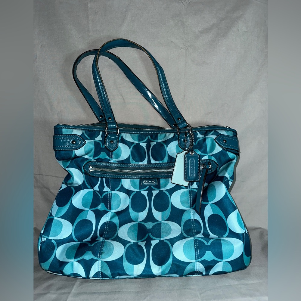 Turquoise suede coach bag